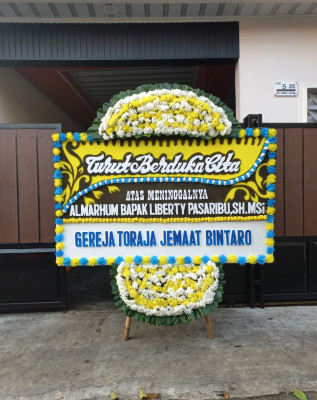 Papan Bunga Duka di Balongpanggang